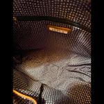 Stylish Brown Leather Handbag with Triangle Pattern Lining Photo 3