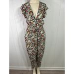Free People  X Revolve Ruffle Your Feather Floral V-Neck Jumpsuit. Size S Photo 5