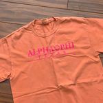 Alpha phi T Photo 1