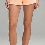 Lululemon  high rise softstreme 2.5” shorts orange, pastel Photo 0
