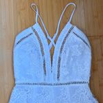Revolve by the way. Rory Lace Romper in White Photo 6