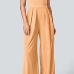 Halara NWT  Side Invisible Zipper Pocket Wide Leg Quick Dry Resort Slip Jumpsuit Photo 0