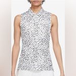 Nike  Dri Fit Printed Sleeveless Golf Polo Women's White and Black Dotted Pattern Photo 1