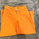 The Comfy Boutique burnt orange flared pants  Size small  Stretchy/ super  Color is like a burnt orange/brown  Photo 3
