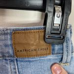 American Eagle  button through high rise light wash mini denim skirt size 00 Photo 9