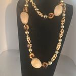 Joan Rivers  gorgeous animal print necklace. The beads are wooden.​ Photo 2