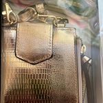 No Boundaries 3 piece gold versatile cellphone, crossbody, chainstrap, pouch gift set NWT Photo 1