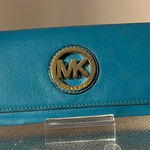 Michael Kors , and fair used condition billfold. I took pictures of the callouts​ Photo 0