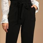 Lulus Lulu’s black ruffle hem ribbon tie pants women’s size large Photo 0