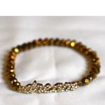 Source Unknown Flashy Rhinestone Accent"Dream" Beveled Gold Tone Beaded 6.5 Stretch Bracelet Photo 1