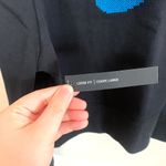 Nike Cropped Long Sleeve Sweatshirt in Black with Colorful Logo Photo 4