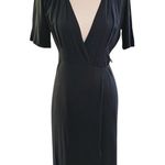 Everly  Dress Black Wrap Midi Dress Minimalist Capsule Closet Staple Photo 0