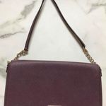 Kate Spade . Maroonish/Dark Purple colored purse Photo 0