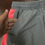 Under Armour Grey and Pink Heatgear Athletic Shorts with Pockets Size X-Small Photo 1