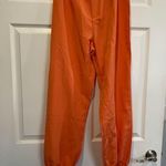 High waisted pants with tie‎ bottom Orange Size L Photo 0