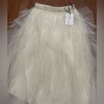 Soho Apparel  Elegant Cream High-Low Skirt Photo 3