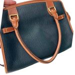 Dooney & Bourke Vintage Buckle Black/Tan Pebbled All Weather Leather purse Photo 5