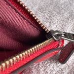 Coach x Disney Minnie Mouse Small Wristlet With Motif Photo 4