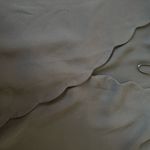 Nine Britton  black scalloped wrap top Photo 2