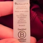 Athleta  Burgundy Maroon Mid Rise Ankle Length Athletic Leggings size XS Photo 4