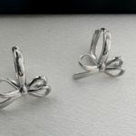 Huggie Bow Silver Hoop Earrings for Women Photo 0