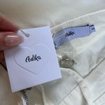 Urban Outfitters NWT Adika White Lace Up Backless Romper with Zipper and Cute Pockets Photo 4