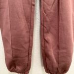 Nike Pink  sweatpants with black logo Photo 2