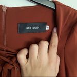 KCSTUDIO Laceup Romper Photo 3