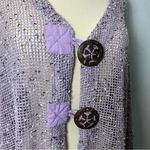 Vintage Purple knit cardigan with button detailing
Size 2x
Brand Kaktus Photo 2