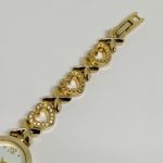 Women’s quartz analog gold tone wrist watch 23mm case white dial 7” Photo 2
