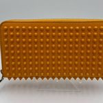 Christian Louboutin
Calfskin Panettone Spiked Zip Around
Wallet Dark Yellow Photo 2