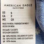 American Eagle OMG How cute is this jumpsuit, blue with small white flowers, smocked halter top, matching belt, has side hand pockets, excellent condition, size small Photo 10