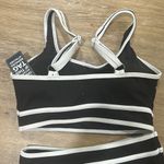 Blooming Jelly NWT women’s high waisted bikini bottoms with black and white top Photo 1
