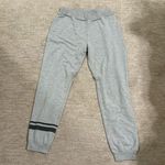 Junk Food Clothing Gray Leggings with Black Stripes Photo 0