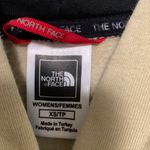 The North Face  women XS hooded sweater tan color with reflective lines Photo 2