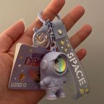 Cute cartoon Astronaut with the sunset light keychain Purple Photo 3