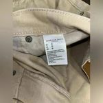 American Eagle High-Waisted Distressed Denim‎ Shorts in Cream White with Raw Hem Detail F4 Photo 3