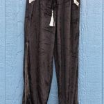 Boutique branded Velvet Jogger Pants with side split
Black Women’s Size Small Photo 0