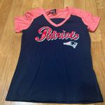 NFL  women’s New England patriots short sleeve shirt size medium. Photo 0