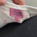 Miami  White Mini Dress w/ Smocked Back and Ruffle Sleeves Photo 8