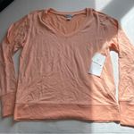 Athleta NWT  Sunrise V neck Sweatshirt Medium peachy orange color thumb holes Photo 5