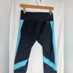 Champion  Women's cropped Leggings in Black and turquoise 
Medium Photo 4