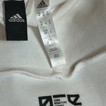 Adidas Women's stylish loose fit hoodie. $45 Photo 5