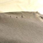 Free People  we the free distressed Gray T-shirt Size M NWT Photo 4