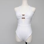 Becca . Modern Edge Cutout Ribbed One-Piece Swimsuit. Photo 7