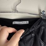 Abercrombie & Fitch size 28P black pleather skirt with slit in the front Photo 2