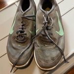 Nike Gray and Green Athletic Shoes Photo 0