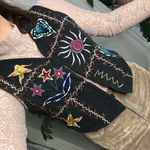 Embroidered V Photo 1