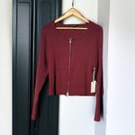 Good American Virgo Rib Zip Front Sweater In OXBlood Photo 1