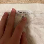 Brandy Melville White Mini Skirt Photo 1